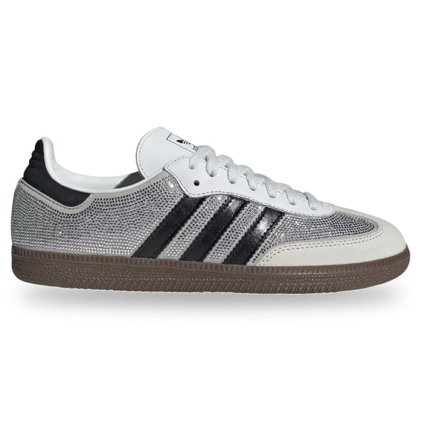 Silver and black Adidas sneaker on a white background