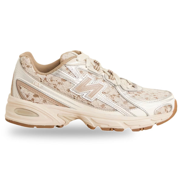 Beige sneaker with floral pattern on a white background