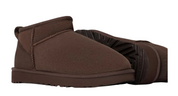 Brown slip-on shoe on a white background