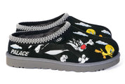 Black slippers with cartoon character design and 'Palace' branding on a white background
