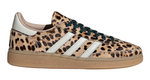 Leopard print sneaker with white stripes on a white background - Image 1