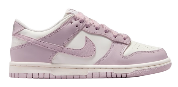 Pink and white sneaker with a visible brand logo on a white background