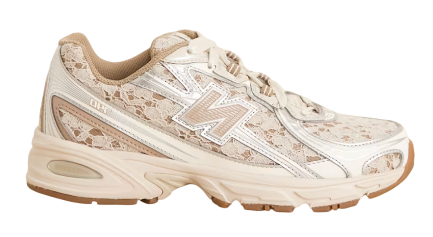 Beige sneaker with floral pattern on a white background