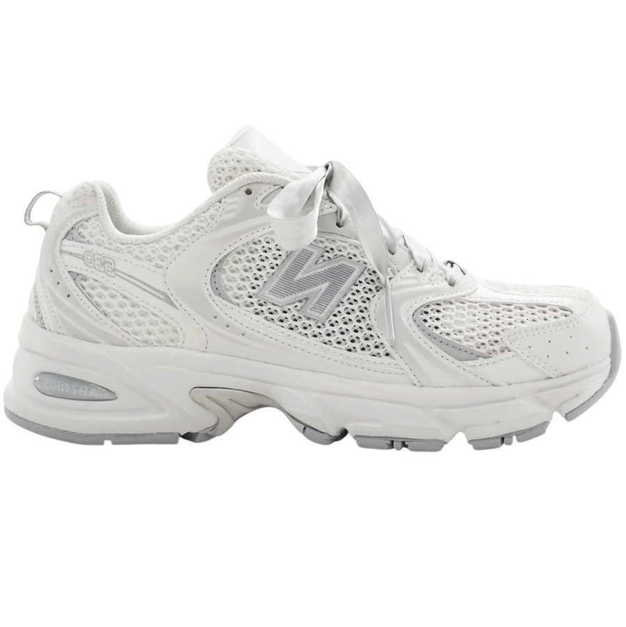 White sneaker with New Balance logo on a white background