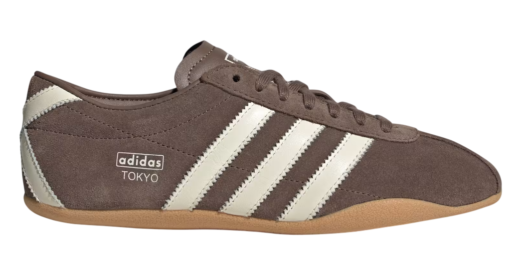 Brown Adidas sneaker with white stripes on a white background
