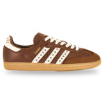 Brown Adidas sneaker with white stripes on a white background - Image 1