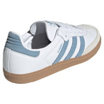 White sneaker with blue stripes on a white background - Image 3