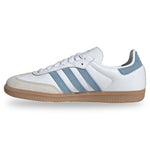White sneaker with blue stripes on a white background - Image 4