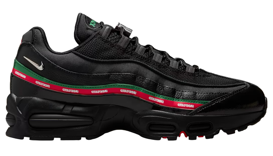 Black sneaker with red and green stripes on a white background