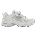 White sneaker with New Balance logo on a white background - Image 1