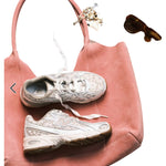 Pink handbag with white sneakers and gold jewelry on a white background - Image 5