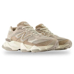 Pair of beige New Balance sneakers on a white background - Image 2