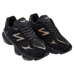 Pair of black athletic shoes with brand logo on a white background - Image 2