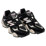 Black and white sneakers with New Balance logo on a white background - Image 2