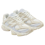 Pair of beige and white sneakers on a white background - Image 2