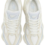 Pair of white sneakers on a white background - Image 3
