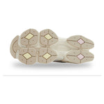 Close-up of a shoe sole with a diamond pattern on a white background - Image 5