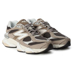 Pair of brown and white sneakers on a white background - Image 2