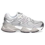 White sneakers with brand logo on a white background - Image 1