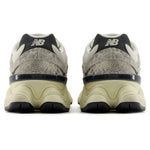 Pair of New Balance sneakers shown from the back on a white background - Image 5