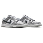 Silver glitter sneakers with black swoosh logo on a white background - Image 2