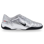 Silver sports shoe with black sole on a white background - Image 1