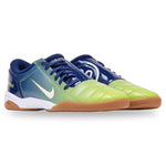 Pair of blue and green sports shoes on a white background - Image 2