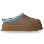 Brown slipper with a blue and white crocheted trim on a white background - Image 1