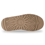 Close-up of a brown shoe sole with a pattern on a white background - Image 6