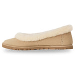 Beige slip-on shoe with white fur lining on a white background - Image 3